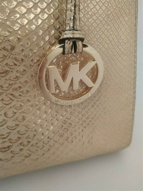 michael kors sutton satchel gold leather|Michael Kors large satchel handbag.